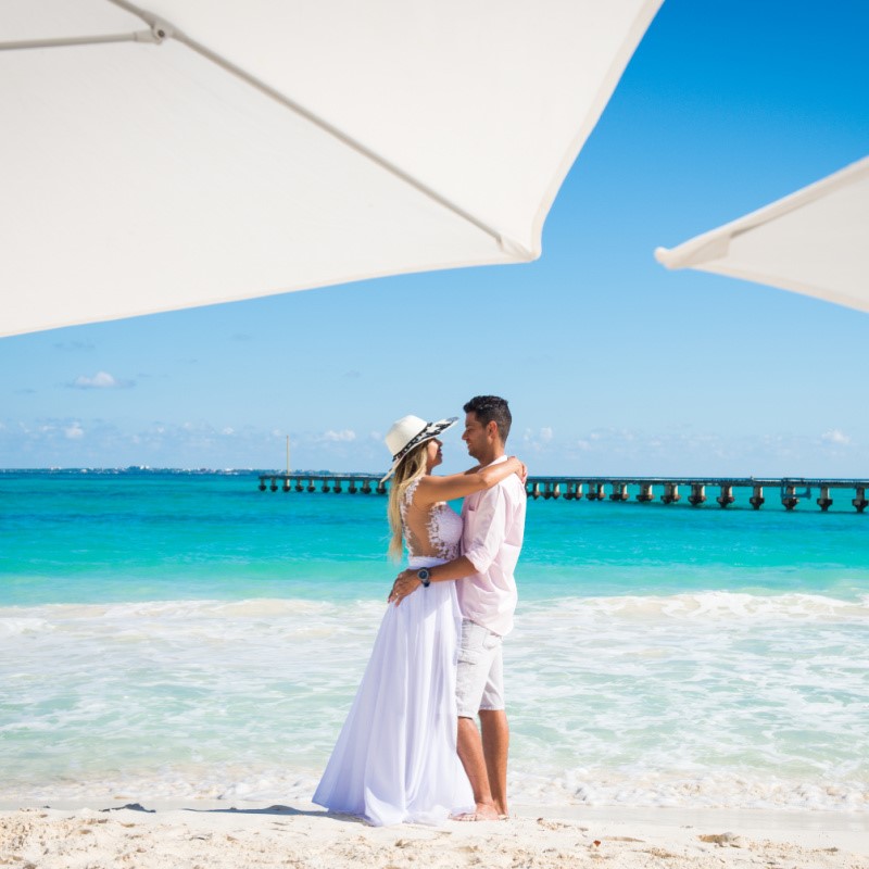Couple Standing on the Beach in Isla Mujeres After Getting Married