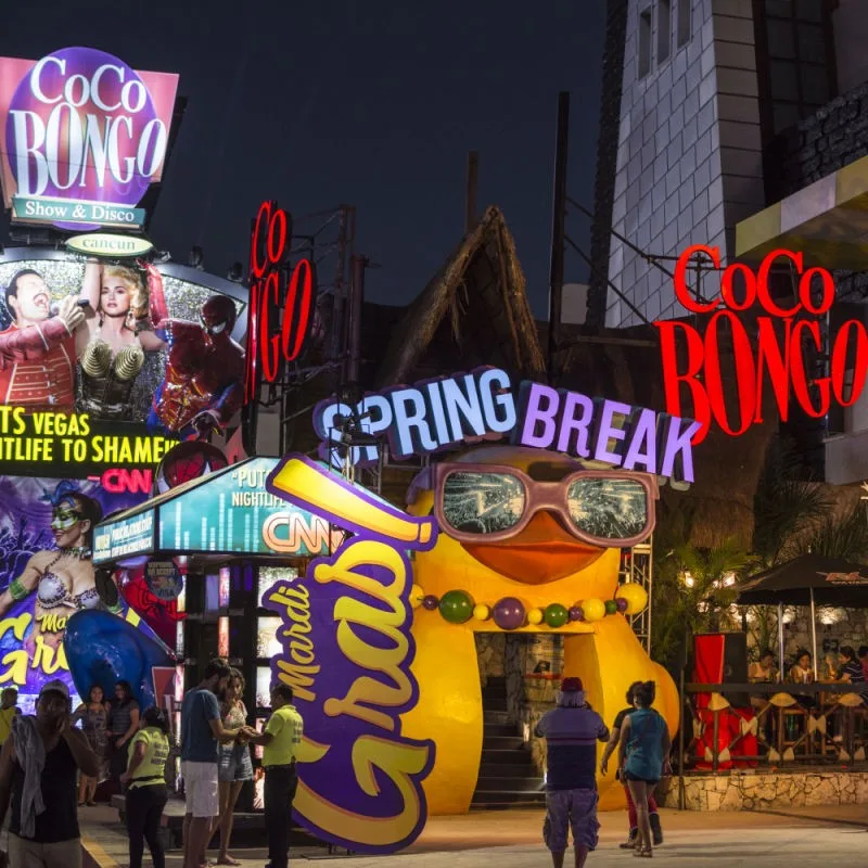 Tourists Standing Around Coco Bongo During Spring Break in Cancun