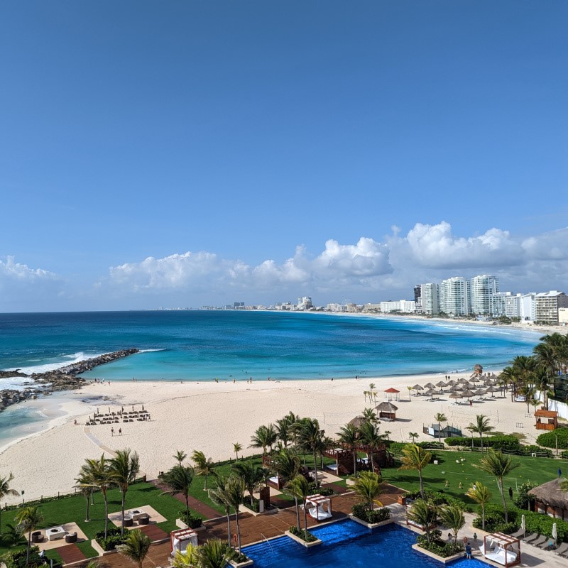 View of Cancun beach with resorts in the background
