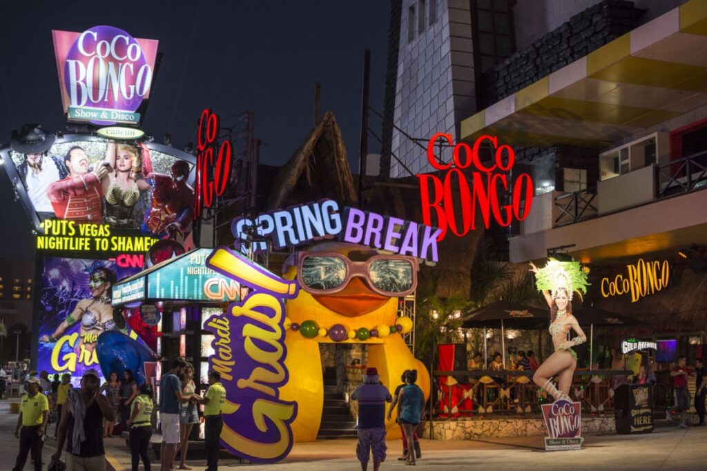 Tourists Standing Around Coco Bongo During Spring Break in Cancun