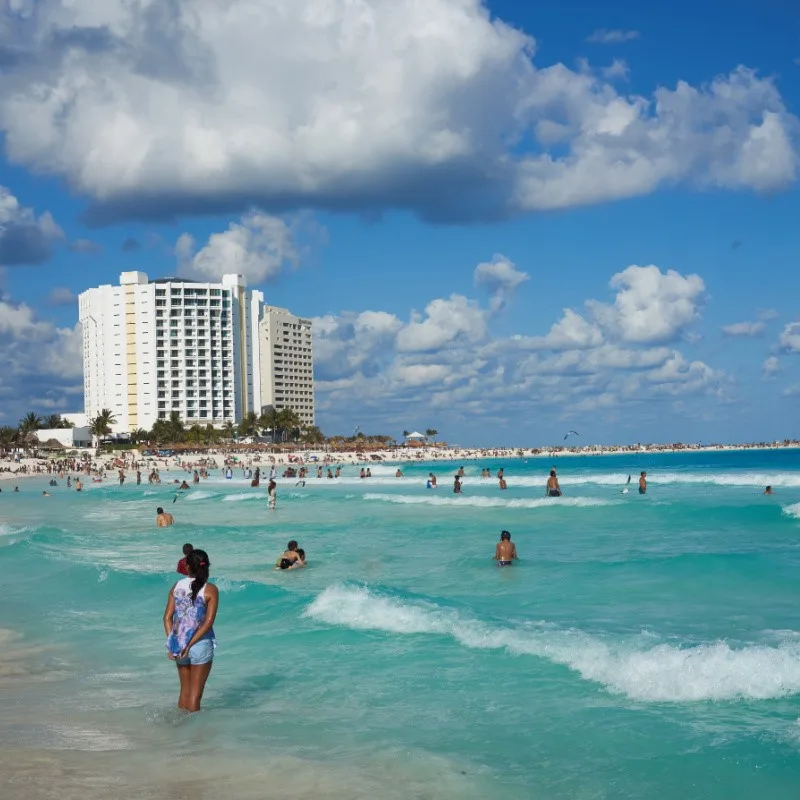 Tourists on a Beach in Front of a Resort in Cancun, Mexico