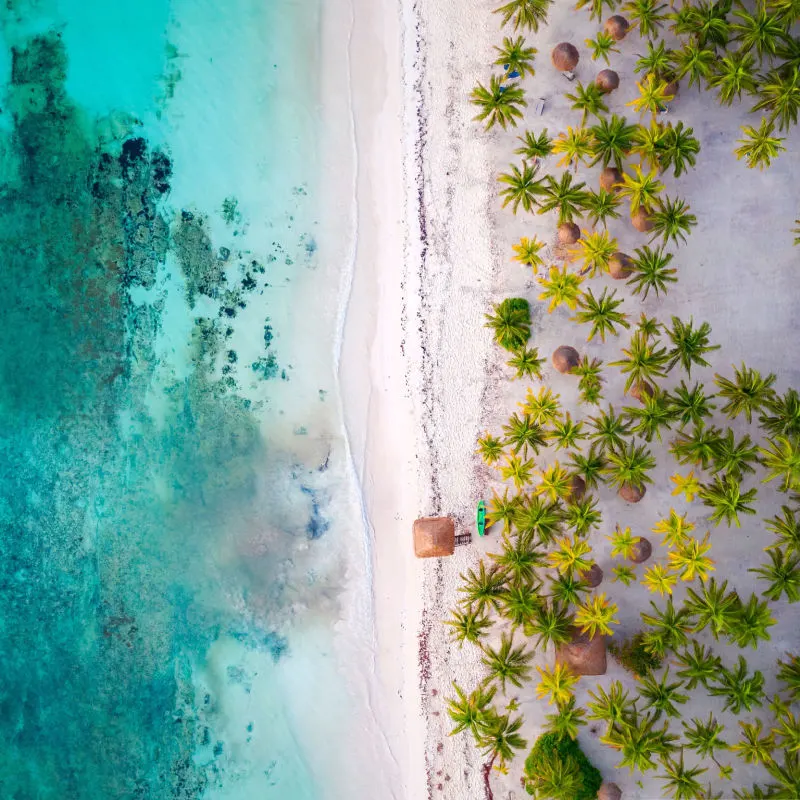 Drone view of a white-sand beach in Tulum