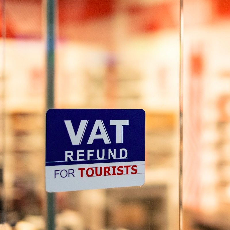 VAT refund signage for tourists put up in front of the store.
