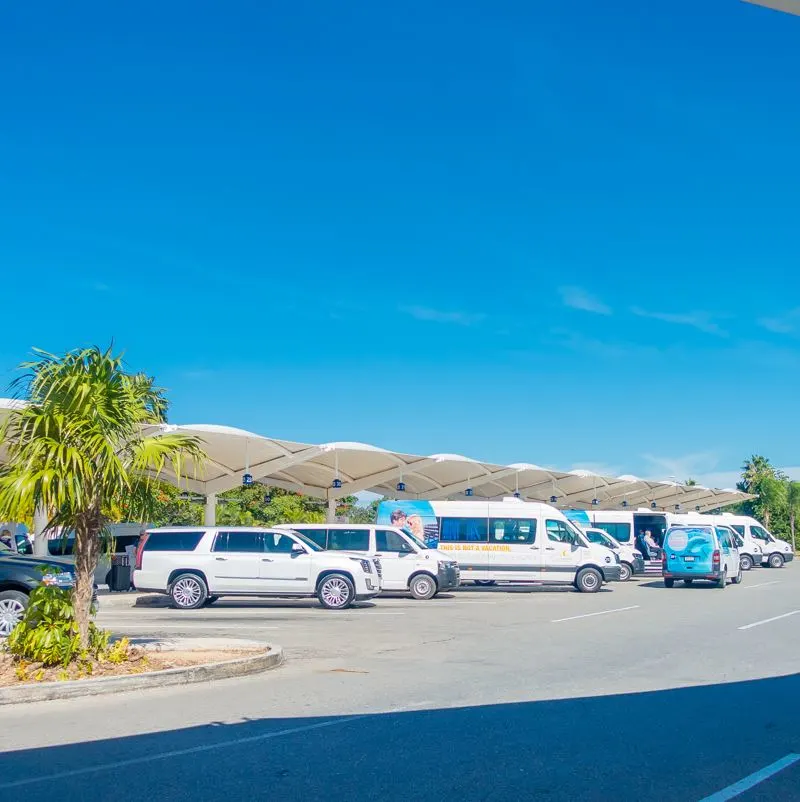 shuttle buses waiting at airport car park
