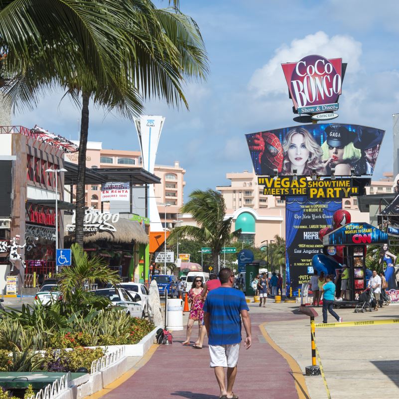 Coco Bongos advertisement sign on Cancun high street
