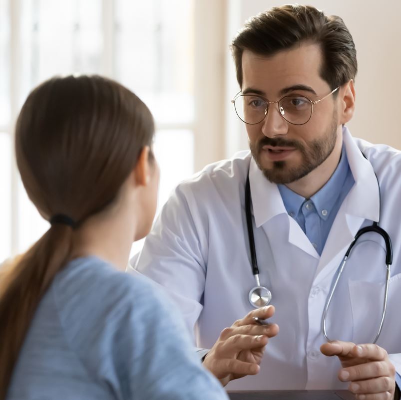Doctor consults with patient