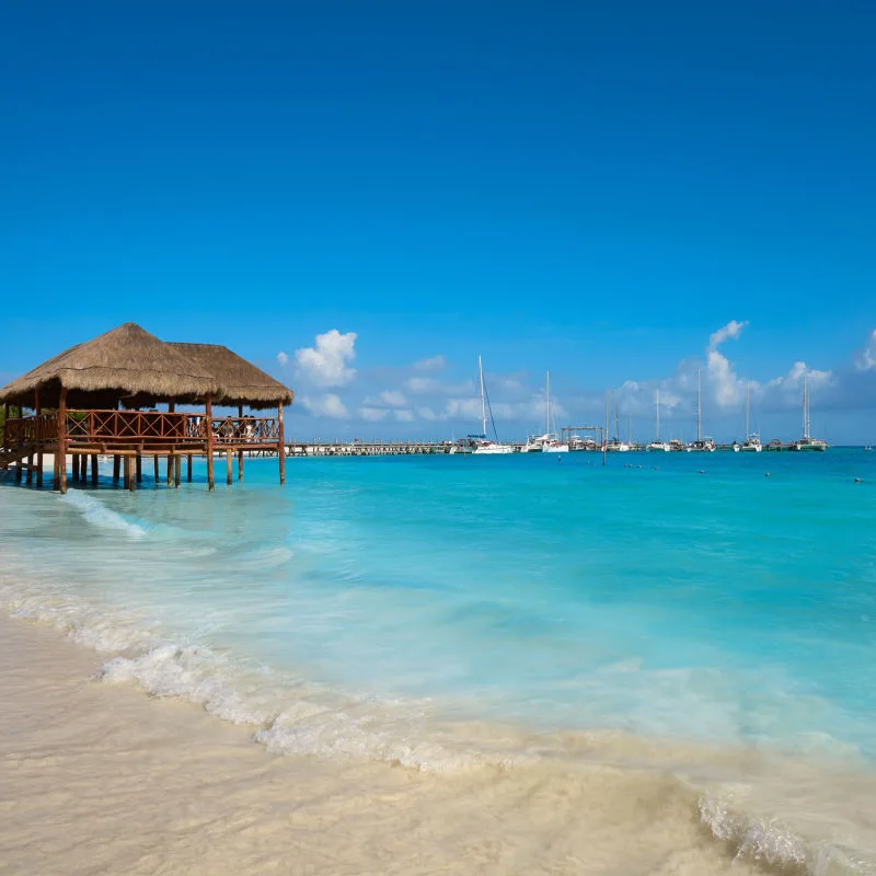 bungalows aside the beach in mexican caribbean 