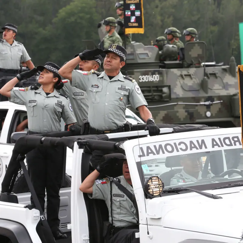 National guard ceremony in Mexico with cars