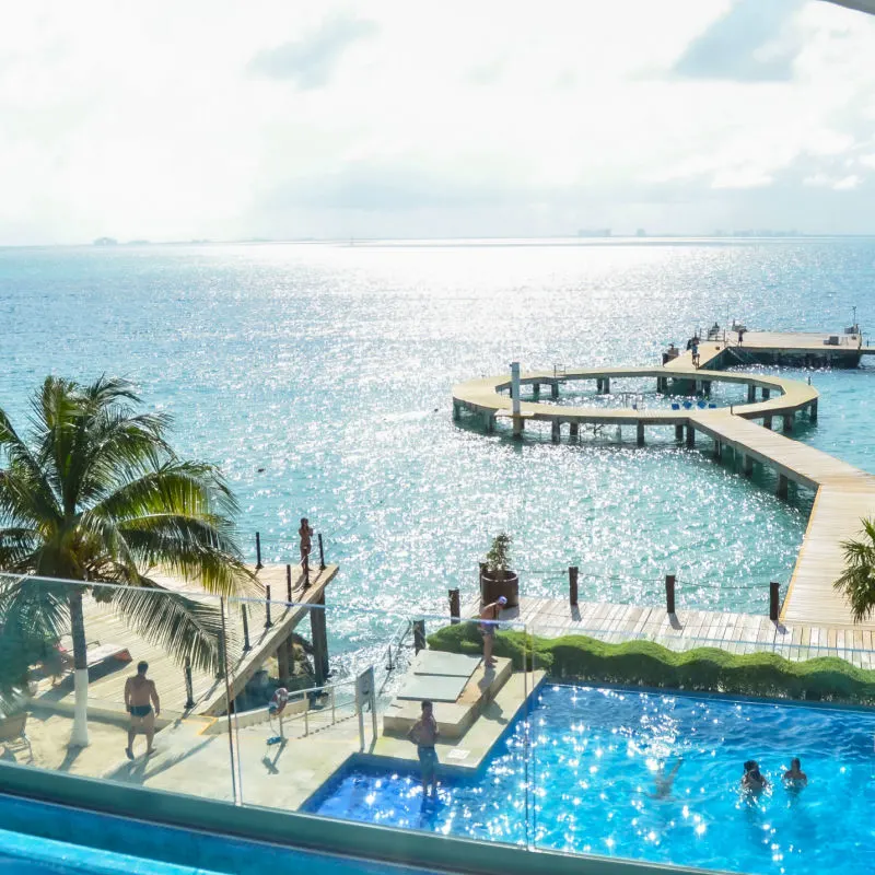 A port and large pool in a resort one in Isla Mujeres