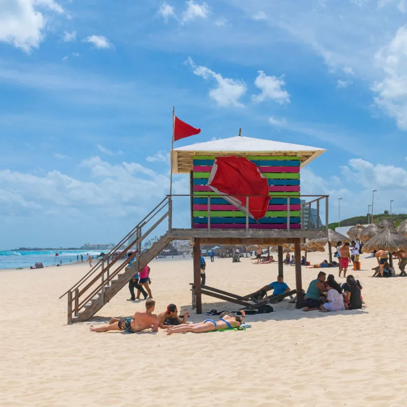 A red flag on display in Cancun warning about sea