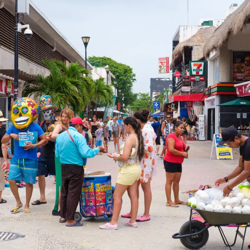 Locals and Tourists on Playa del Carmen's 5th Avenue
