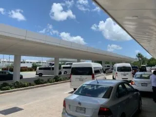 Cars, Taxis, and Shuttles Outside of Cancun International Airport