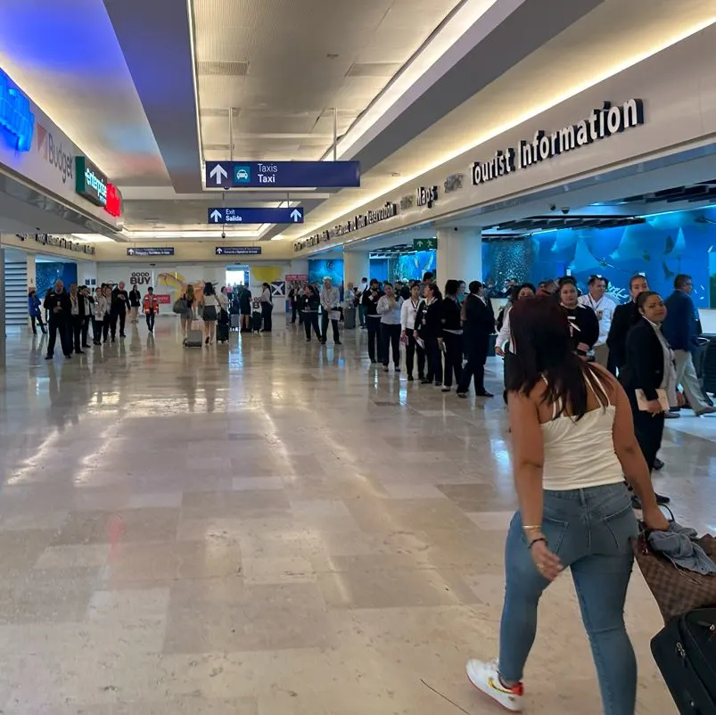 Woman walking out of Cancun airport