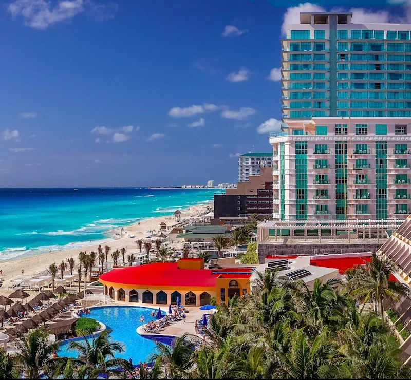 Cancun Resort with beach during day.