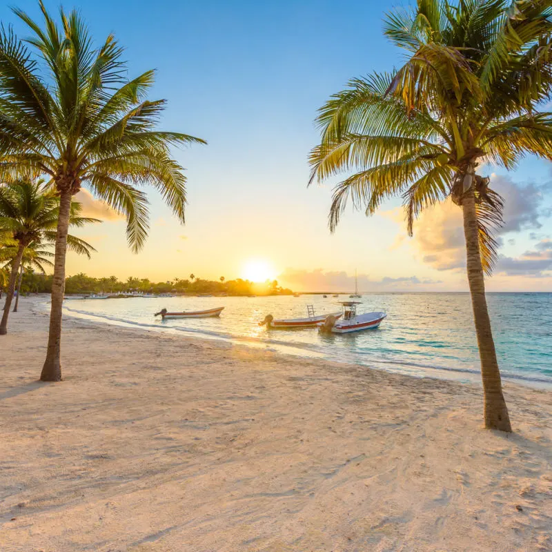 A clean and beautiful beach in Akumal during sunset 