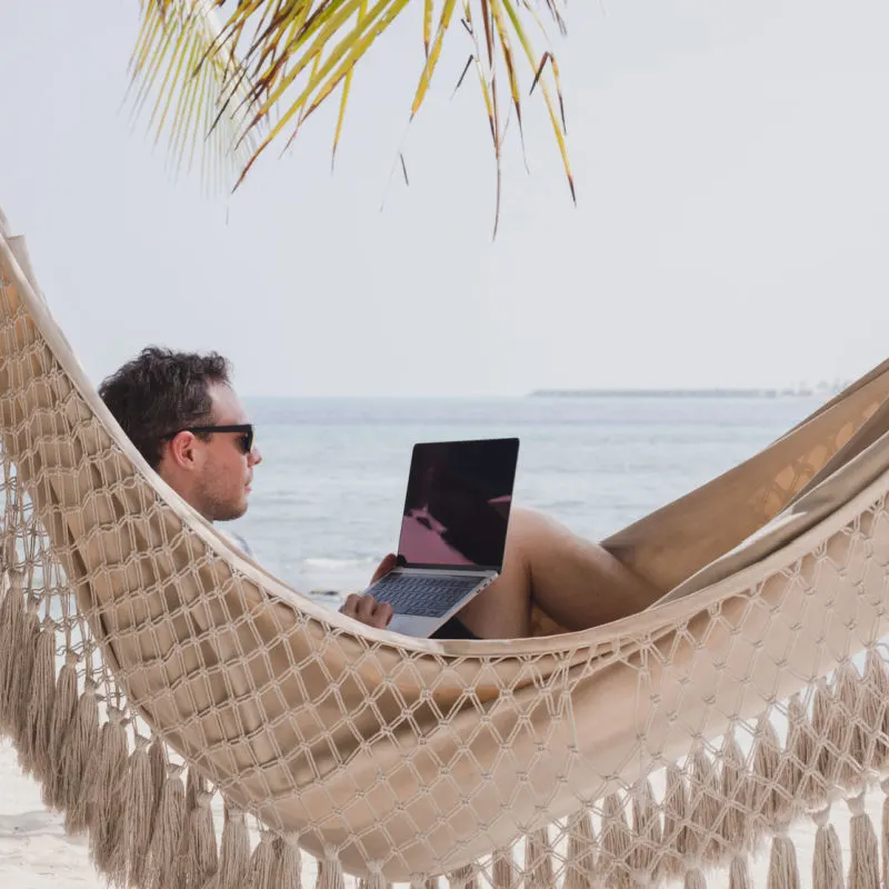 Man working on beach in Cancun 