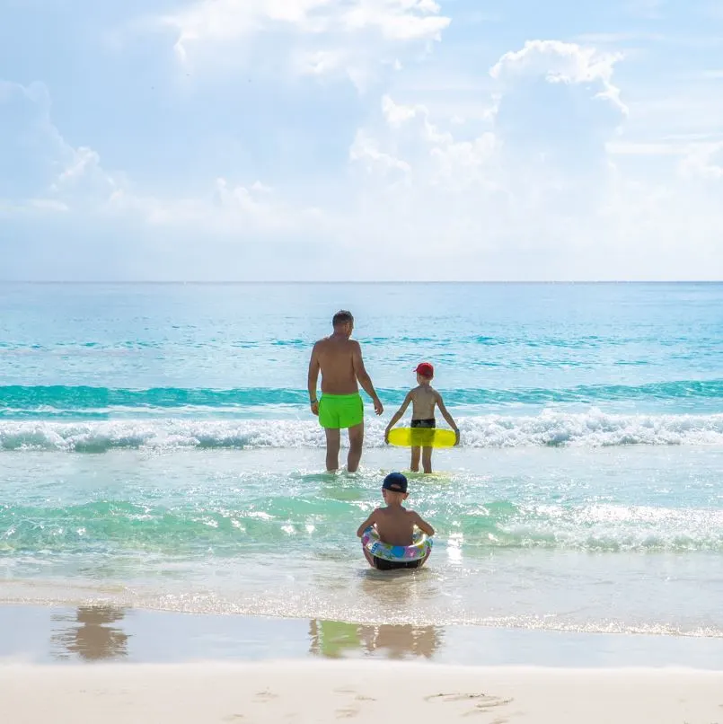 Family at the beach in cancun