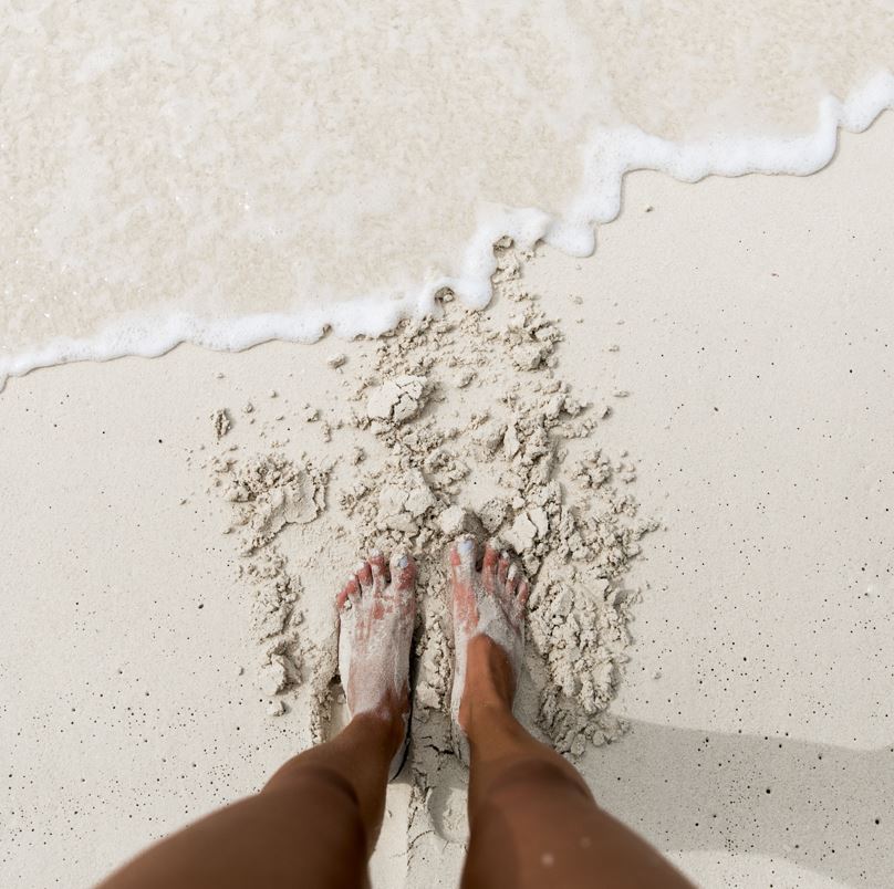 Feet in the sand cancun