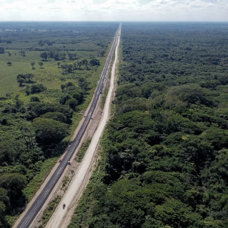 Massive railway track belonging to the Maya Train as it traverses the forest