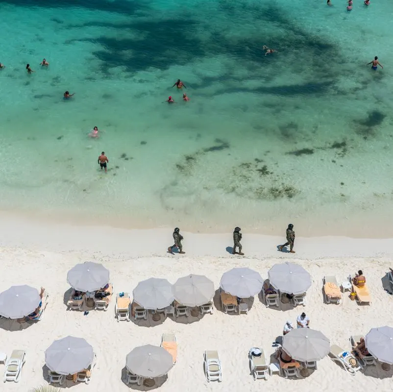 National Guard patrolling Cancun beach