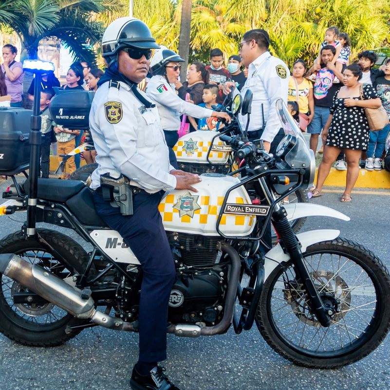 Cancun traffic police officer on a motorcycle