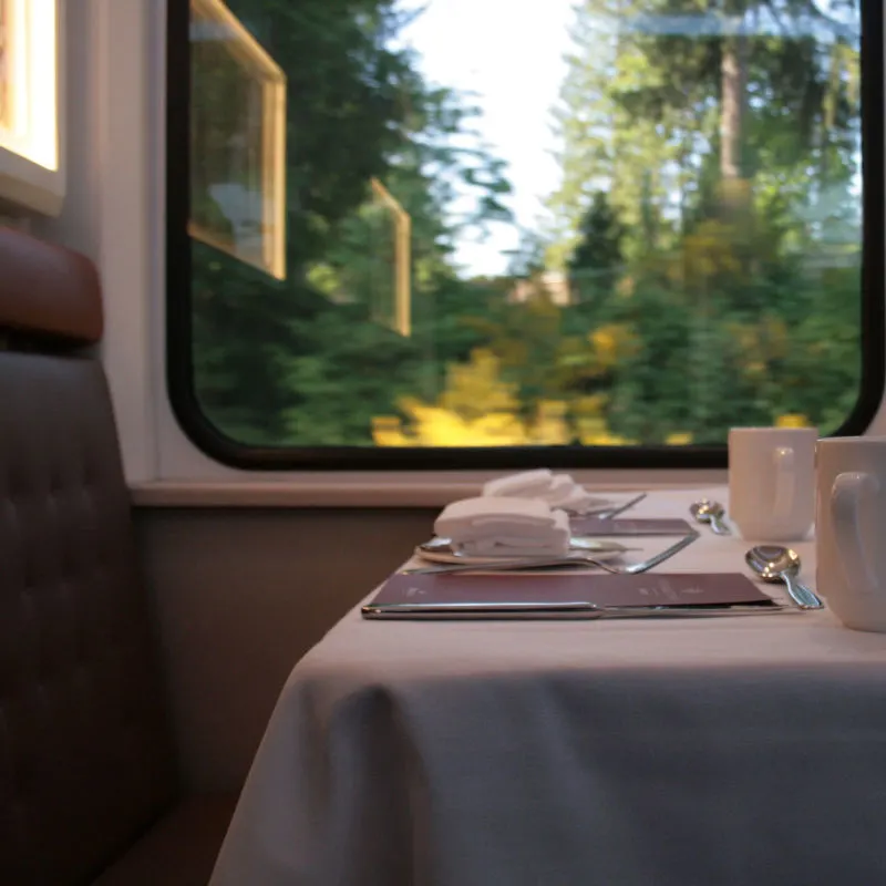 Maya Train view inside with a table in the restaurant
