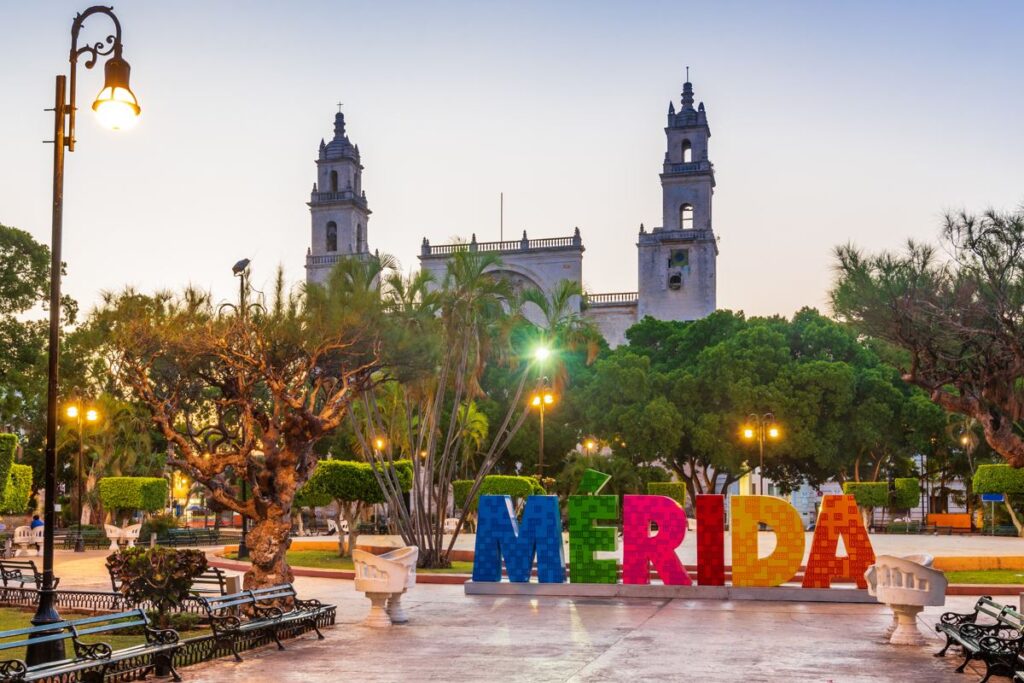 Merida sign in front of a church in mexico