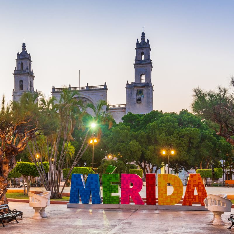 Merida sign in front of a church in mexico