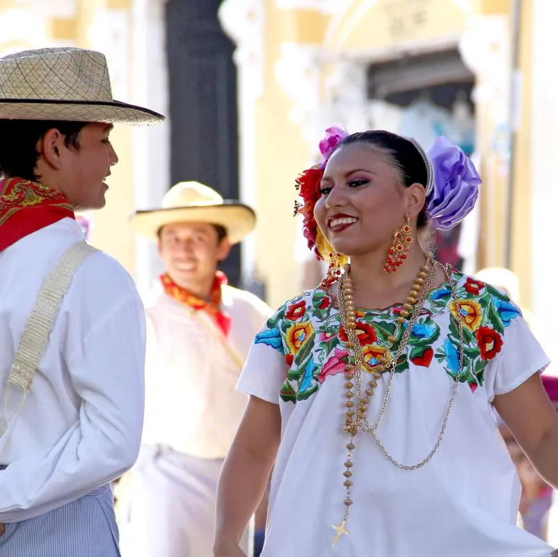 A man and woman in traditional Yucatan dress