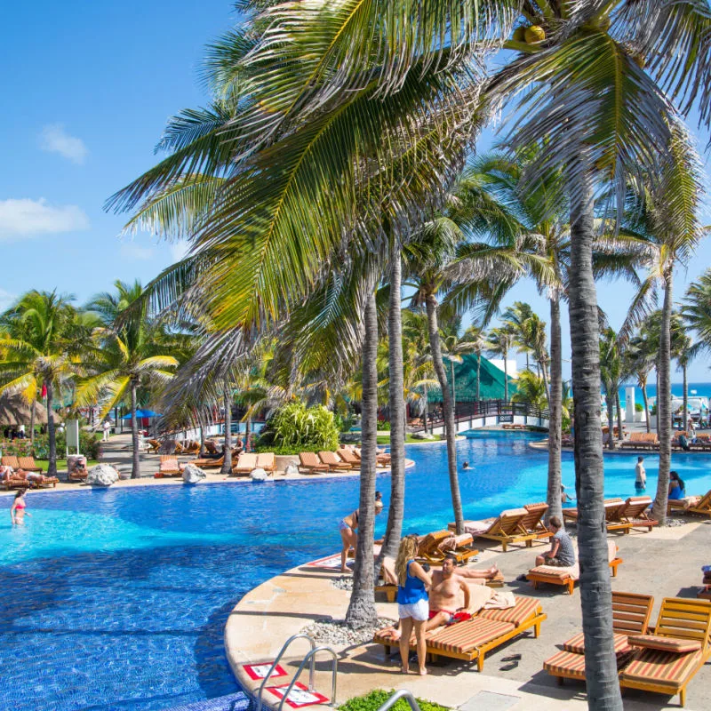 travelers enjoying cancun resort