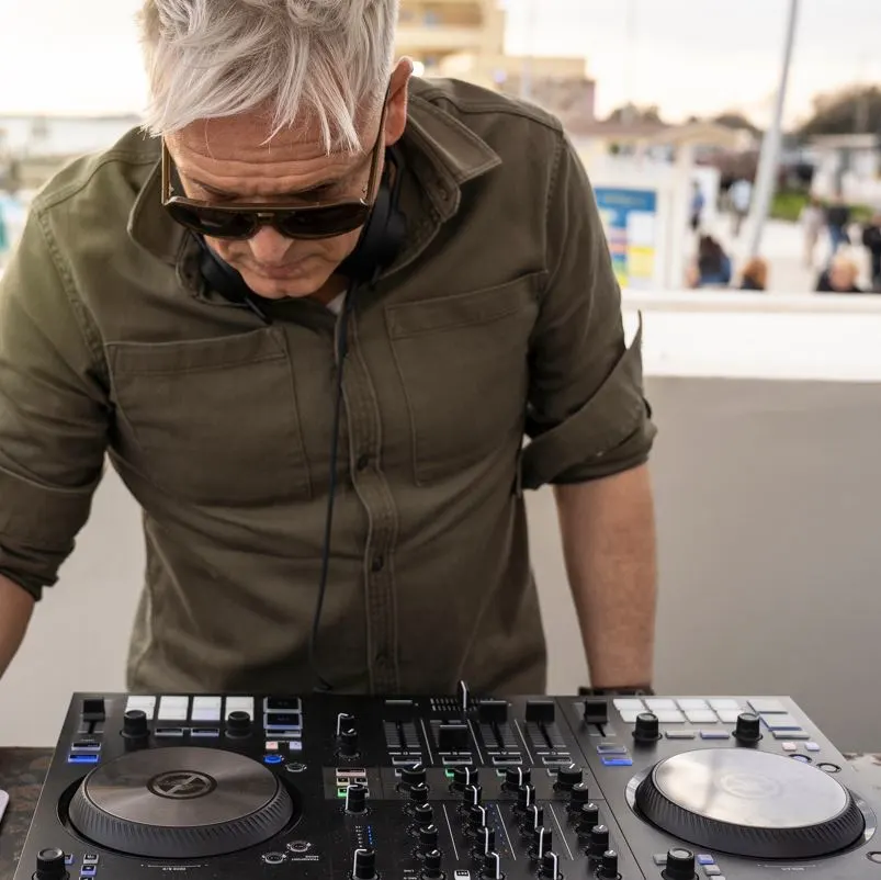 A DJ playing a show in Tulum