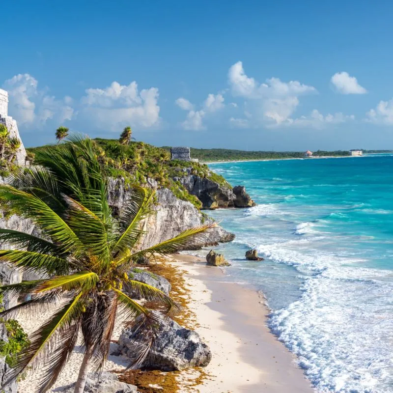 Tulum's archeological zone with a beach next to it