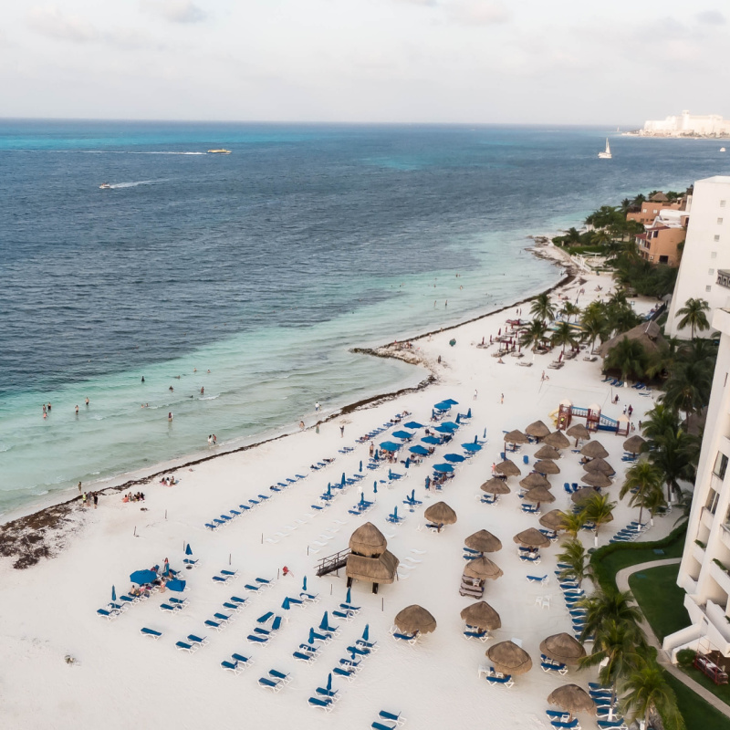 Aerial View of Sargassum in Front of a Resort on a Beach in Cancun, Mexico