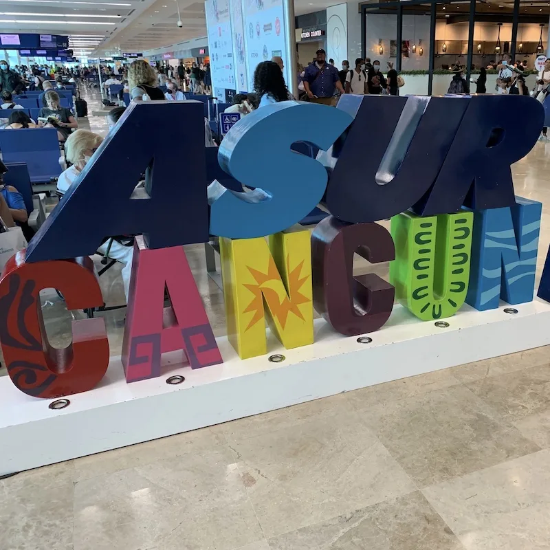 cancun airport sign