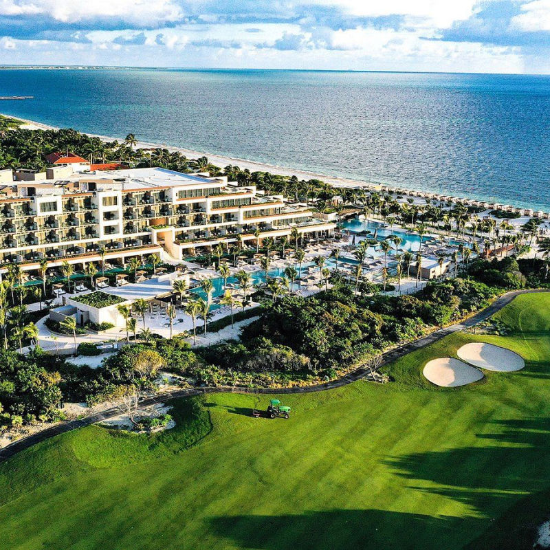 Aerial short of the ATELIER Playa Mujeres resort and golf course
