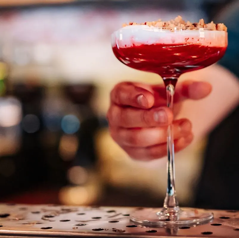 A cocktail on a bar