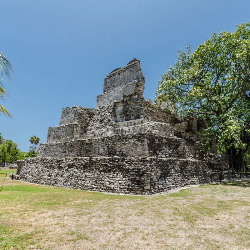 El Meco ancient Mayan structure with blue skies 