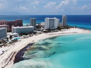Mexican Navy Deployed To Clear Sargassum Seaweed From Cancun Beaches
