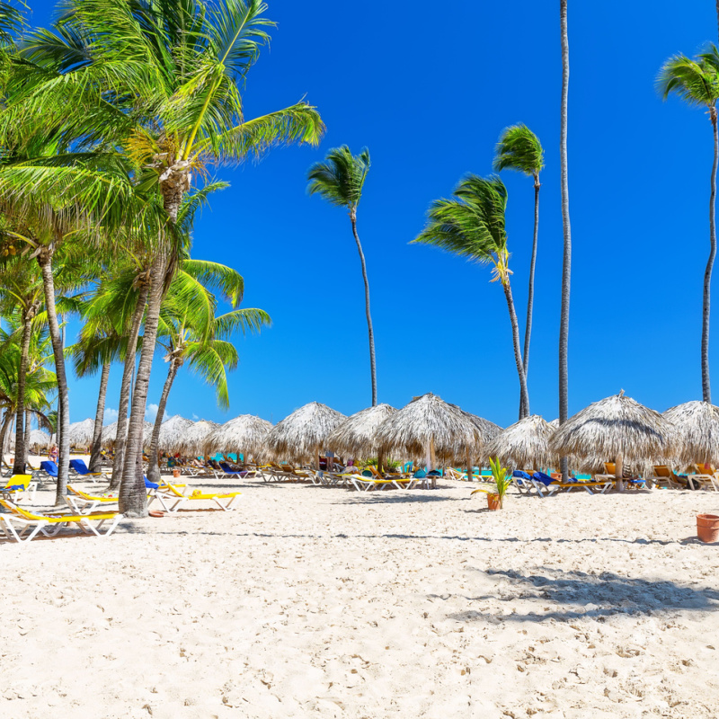 A white-sand beach in Costa Mujeres with powdery sand and blue skies 