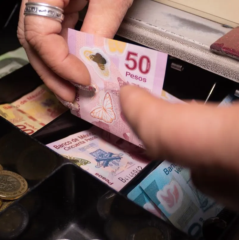 Pesos in a Cash Register