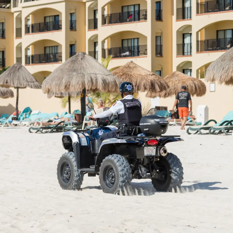 Police Officer Patrolling in the Cancun Hotel Zone
