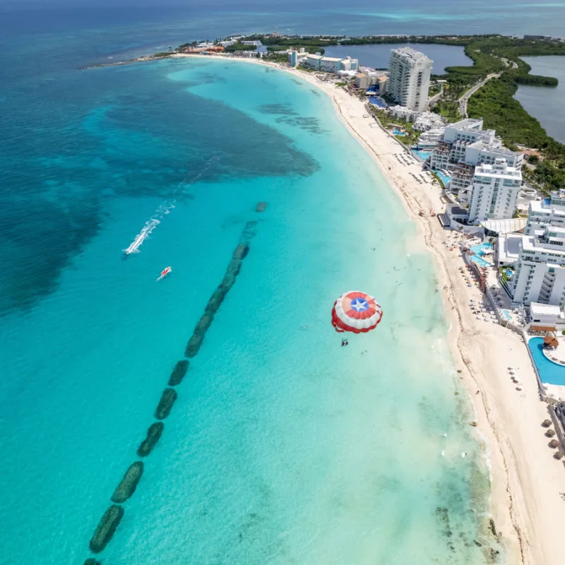 Aerial view of Cancun resorts and blue waters
