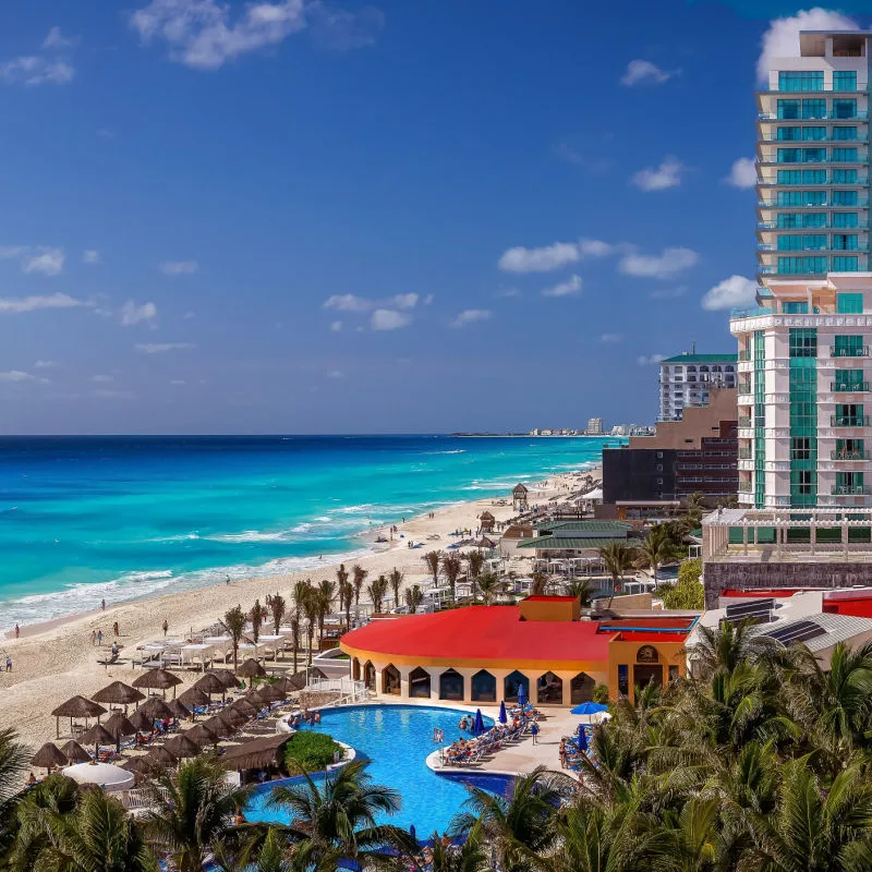 Cancun Resort and Tourists on the Beach