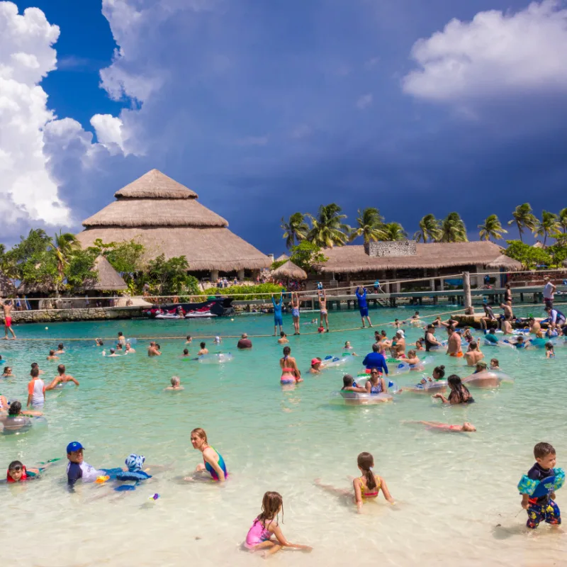 Families on Vacation at Xcaret Park near Cancun, Mexico