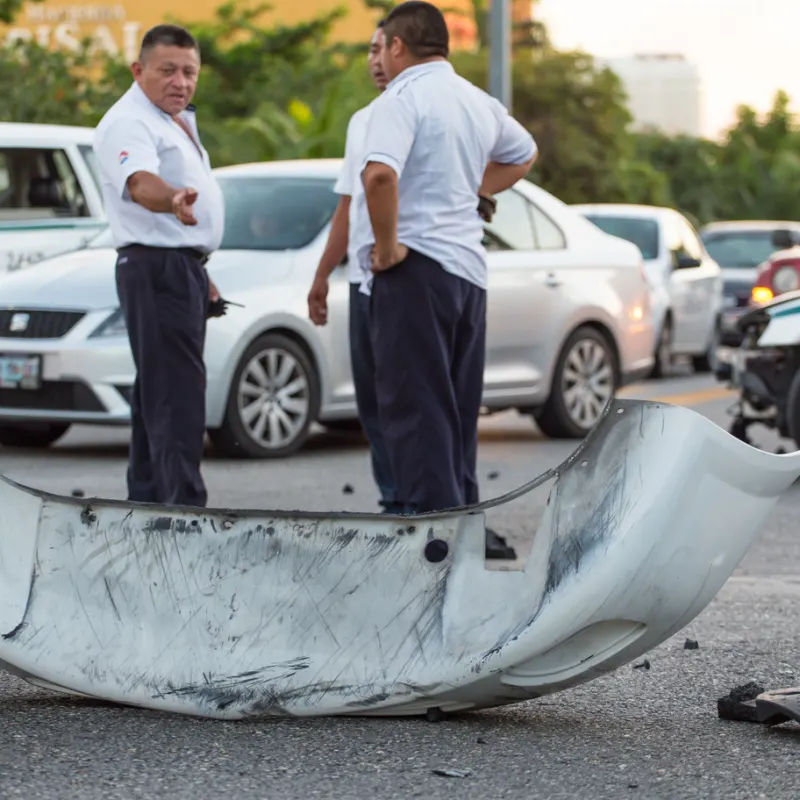 Police on a road next to a taxi incident 