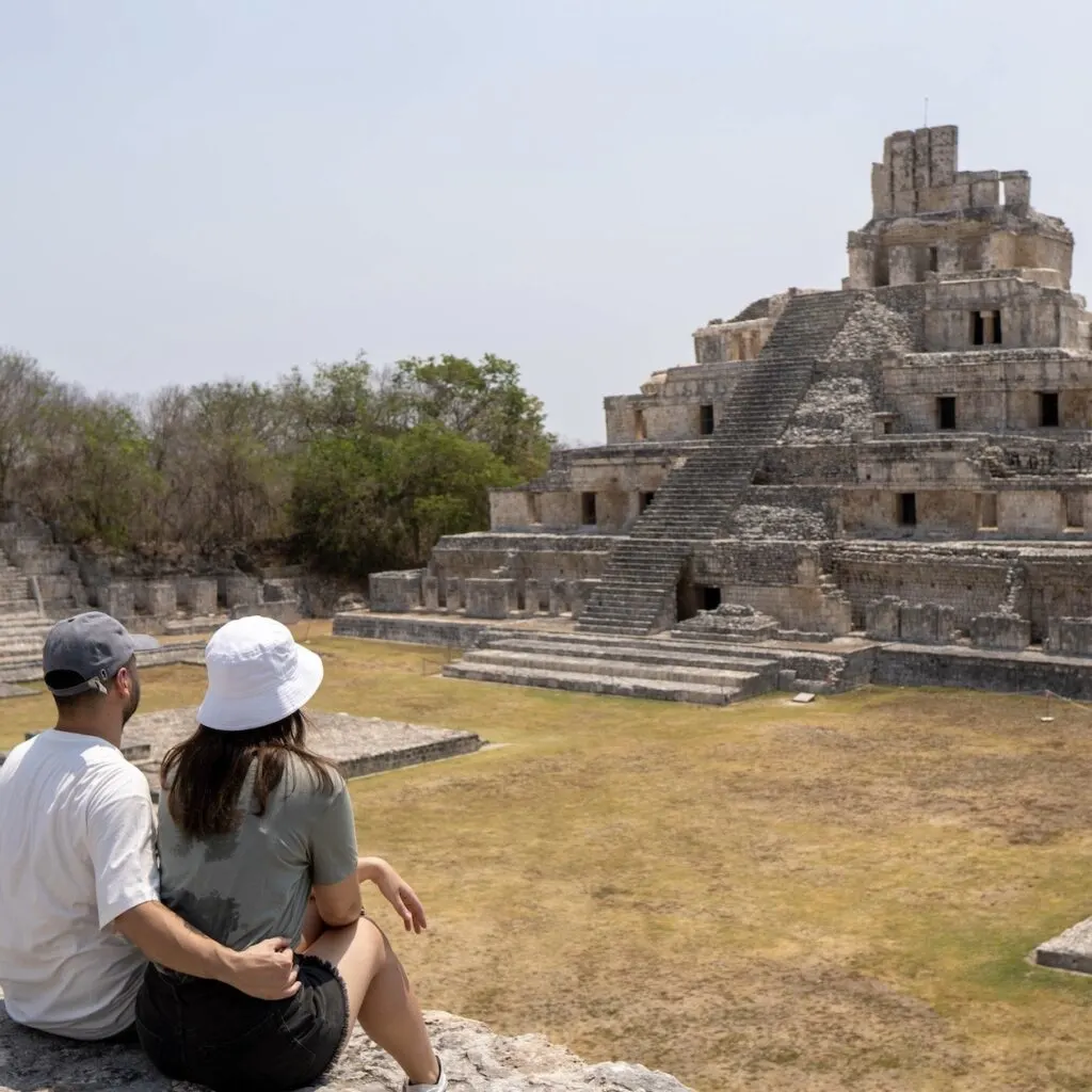 couple at mayan temple ruin