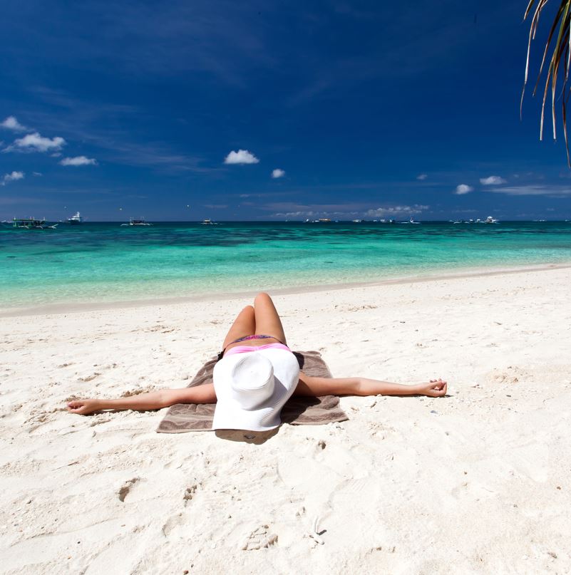 woman lying on a beach