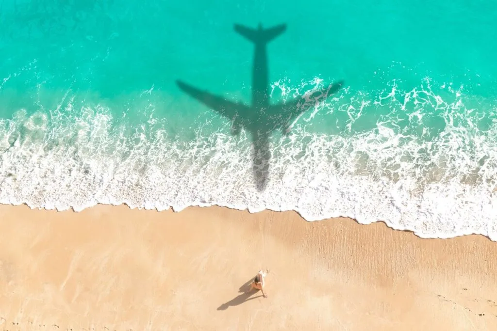 Airplane over beach
