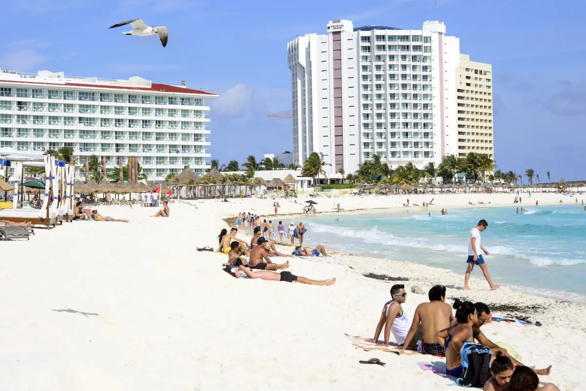People on the beach in Cancun