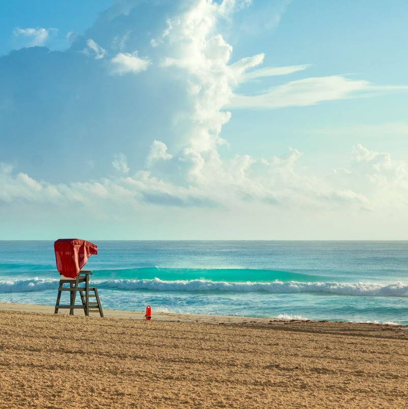 a lifeguard post on a sunny beach